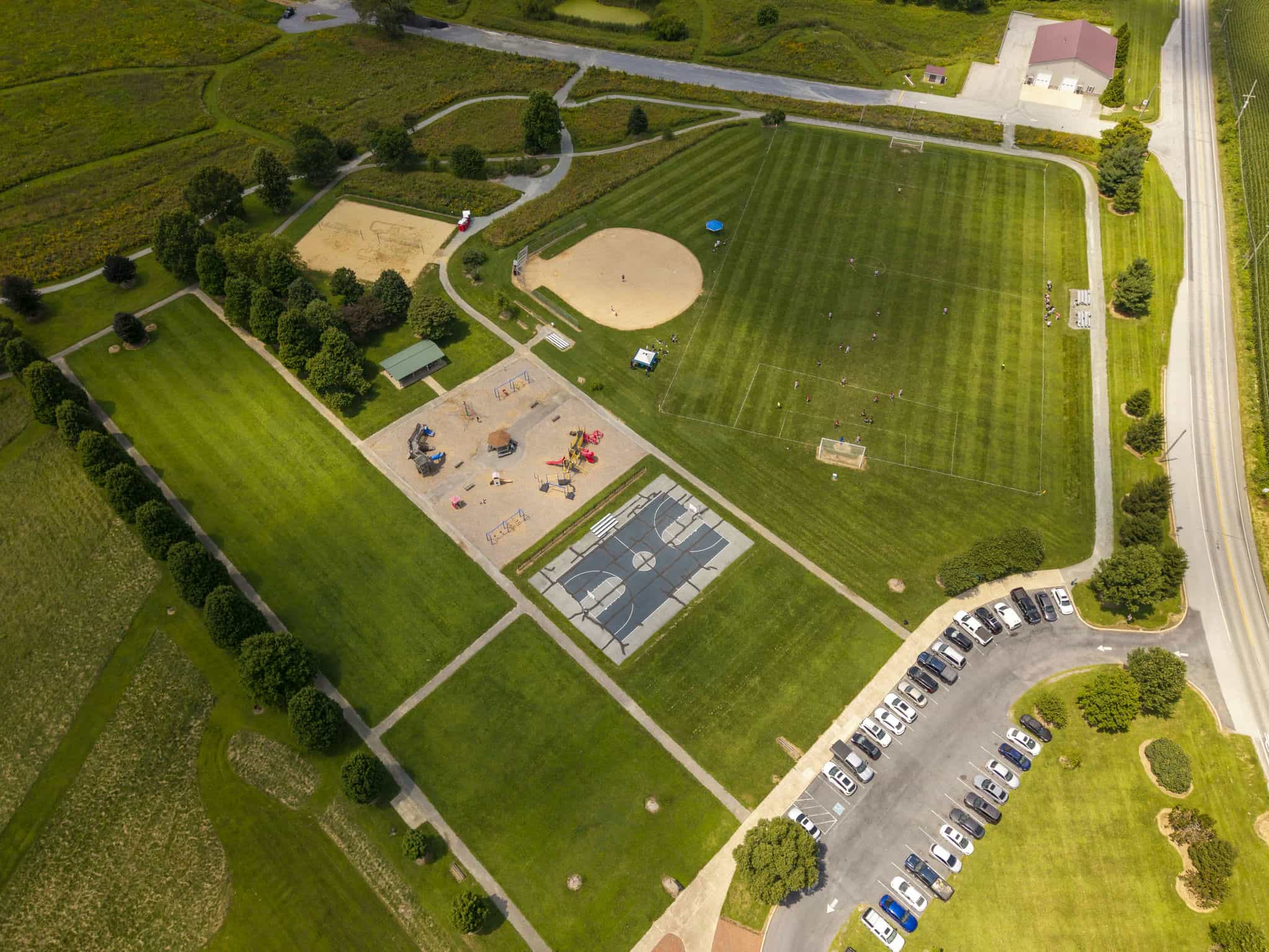 Aerial view of a sports complex and athletic fields